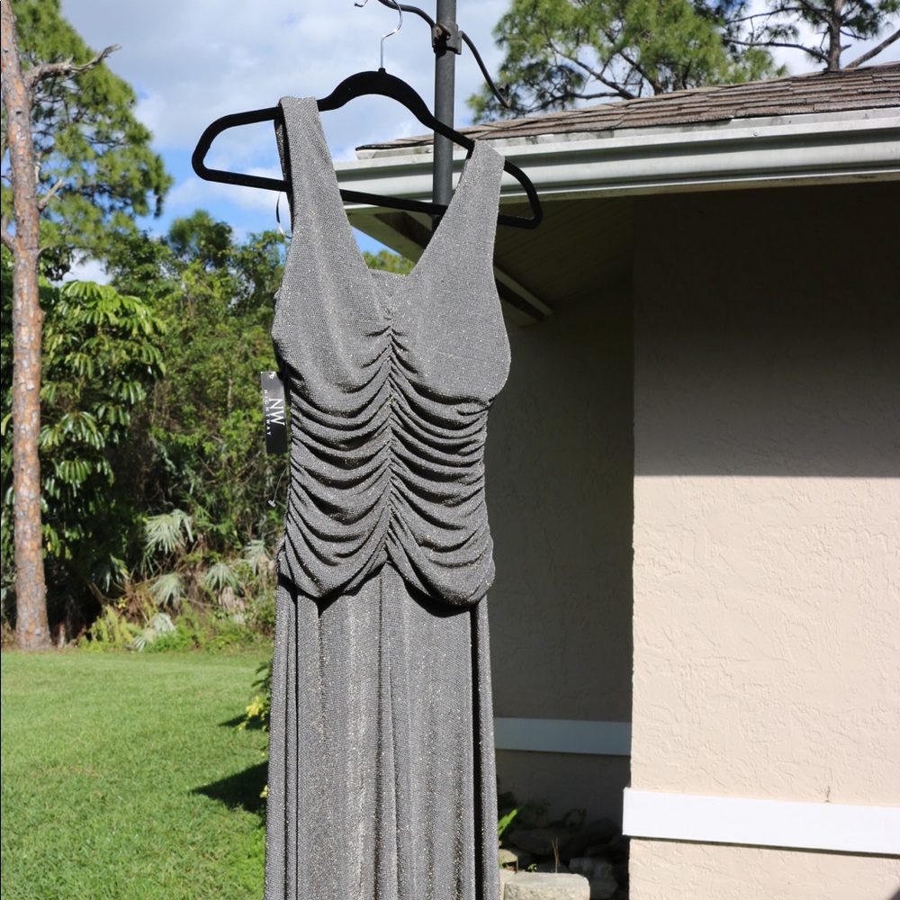 Stunning floor length dress in the color is called Mocha.